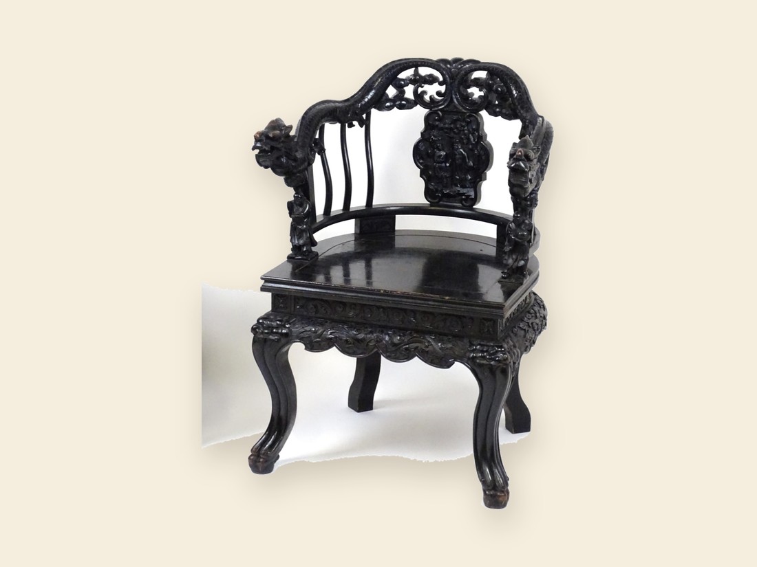 Qing dynasty carved dragon armchair