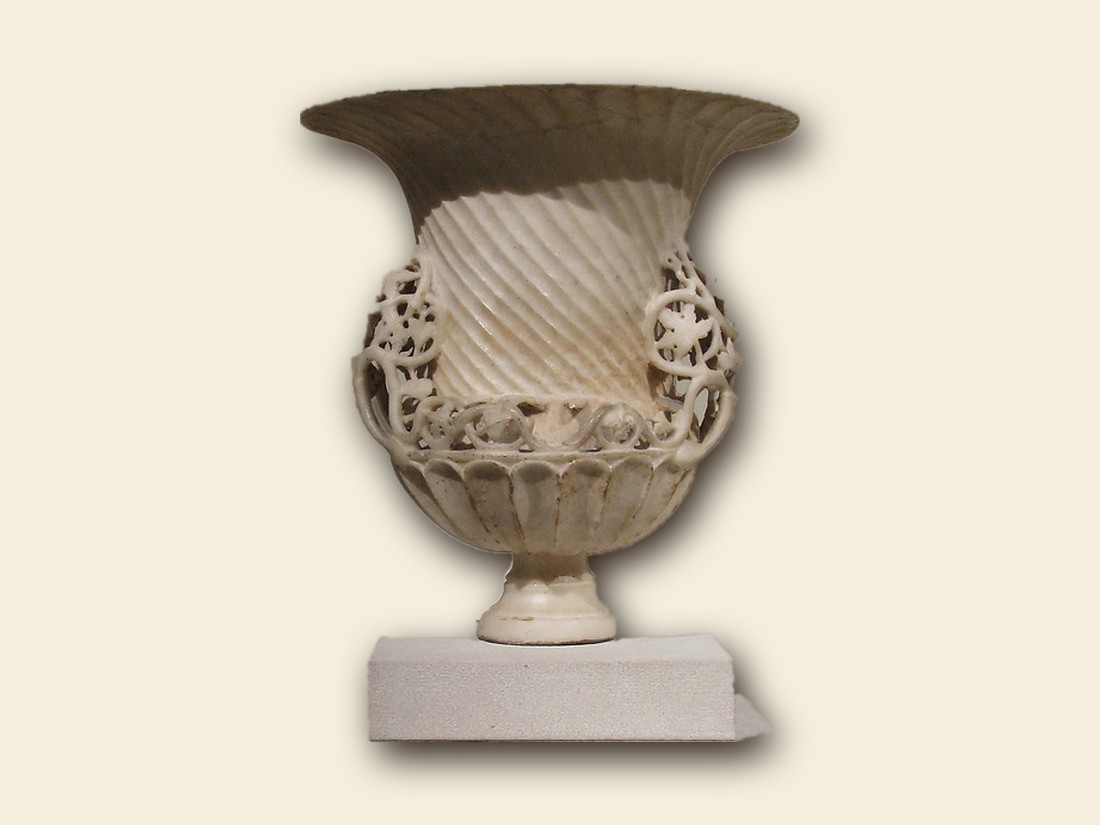 Carved white marble garden urn